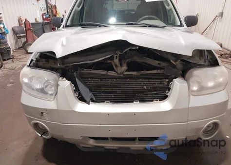 2005 Ford Escape Limited z USA, uszkodzony, nr VIN 1FMCU04165KE24049